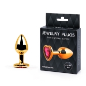 Золотистая анальная пробка с малиновым кристаллом-сердечком - 7 см. - Anal Jewelry Plug - купить с доставкой в Прокопьевске